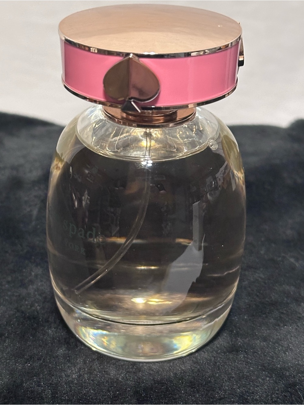 kate spade perfume bottle with pink and gold cap